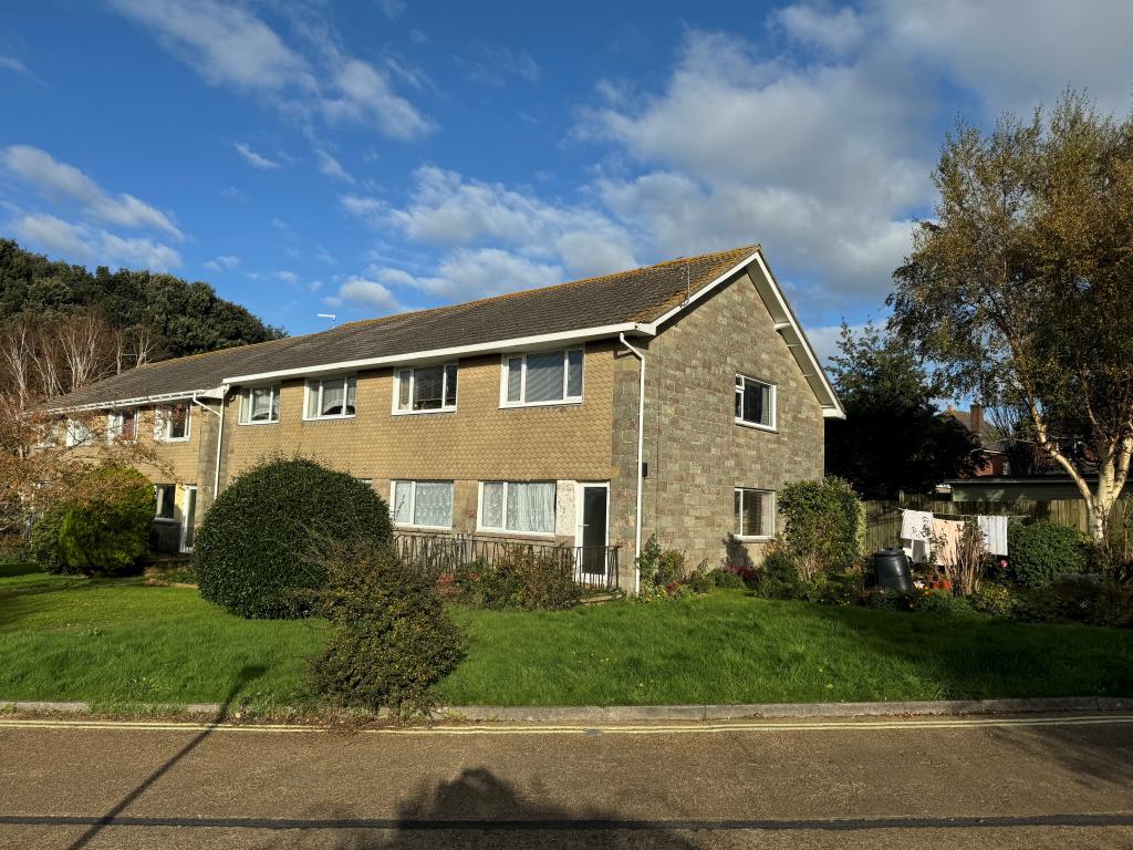 Lot: 62 - GROUND FLOOR FLAT WITH GARAGE FOR INVESTMENT OR OCCUPATION - View of building taken from the road